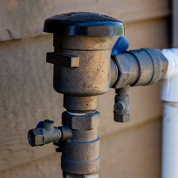 Spill-resistant vacuum breaker demonstrated during backflow prevention training for certified backflow testers